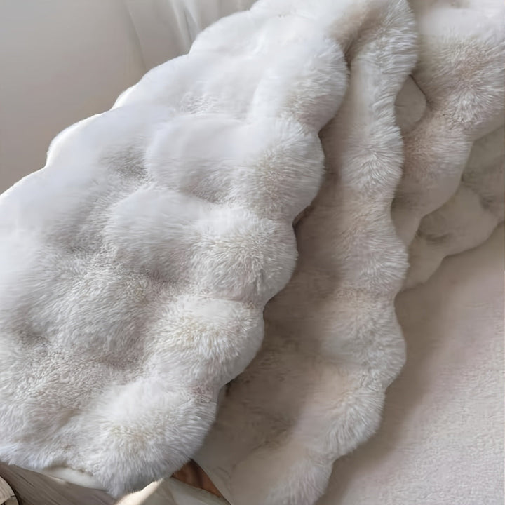 Vikbua™ Rundt luftig teppe med boblestruktur i tett, myk fleece