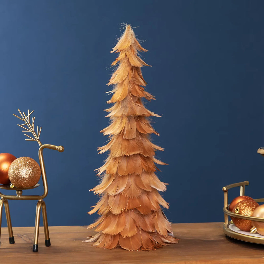 Lite oransje fjærjuletre med glitter
