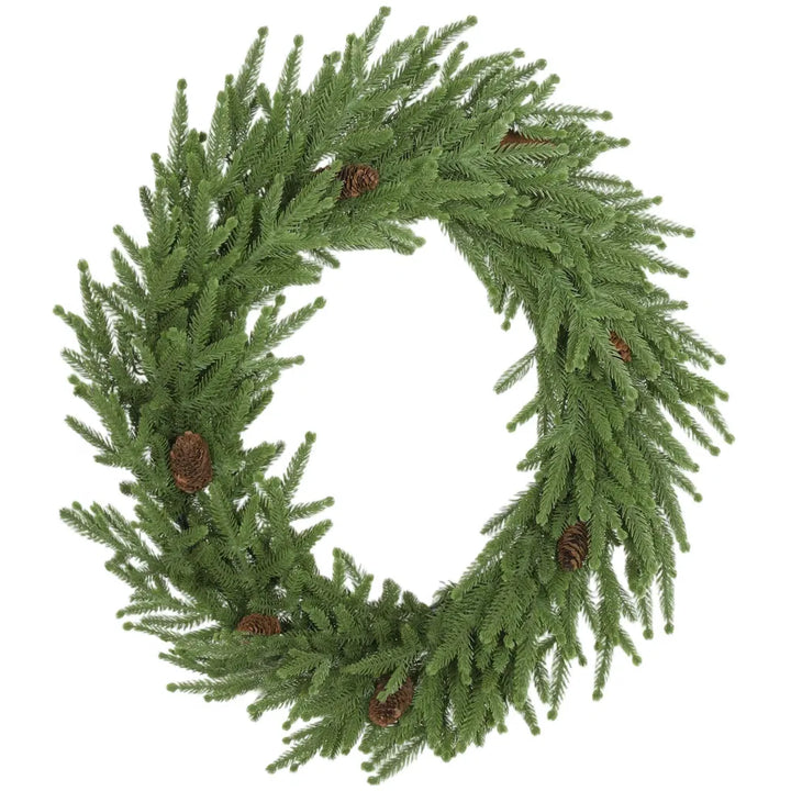 Grønn julekrans med kongler på dør