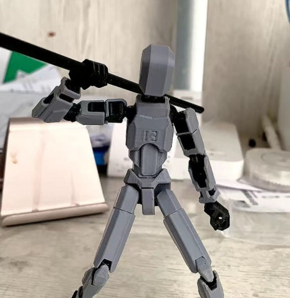 Bevegelig robotfigur i positur