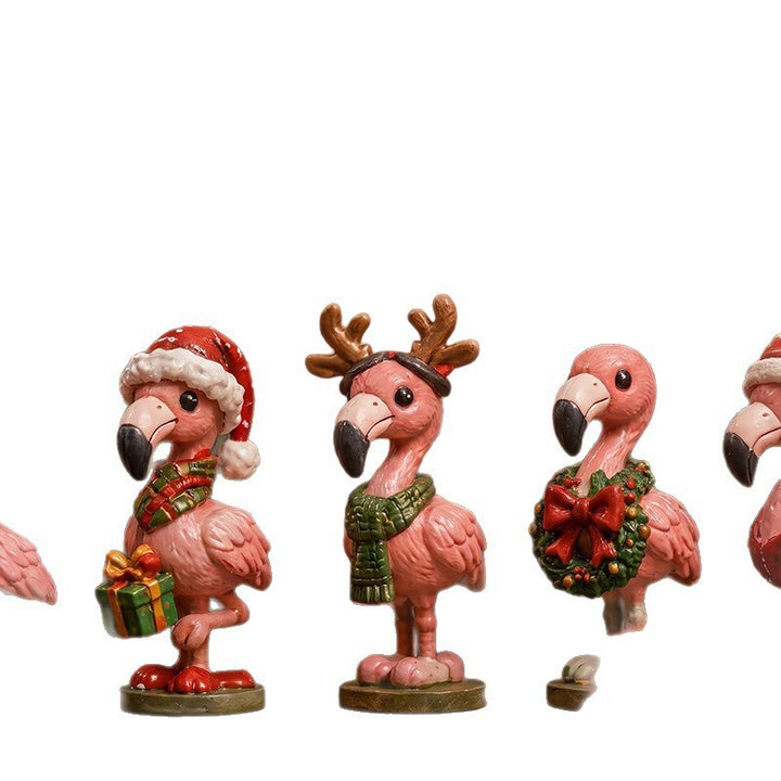 Julekalender med flamingofigurer i juleklær