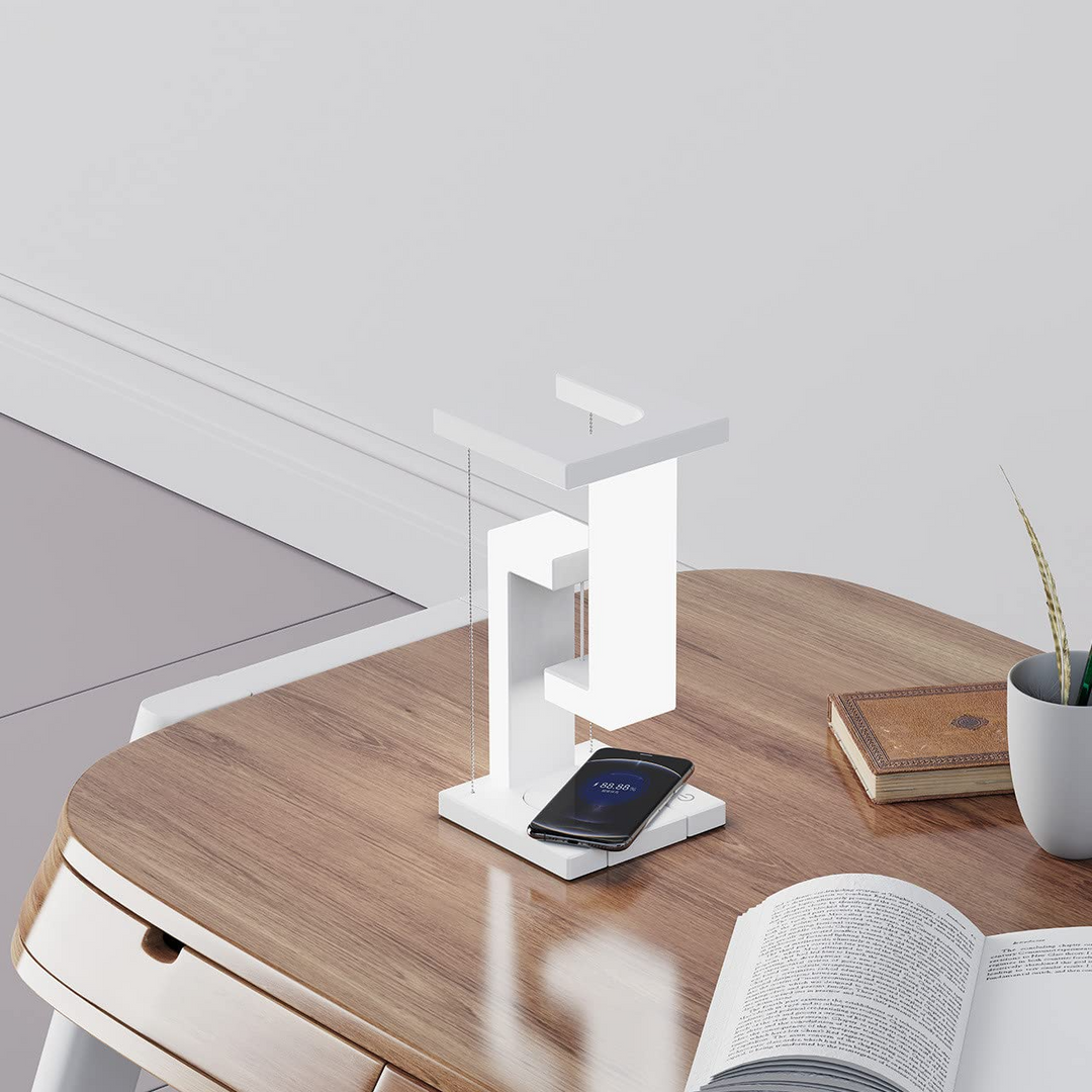 Hvit svevende lampe med mobillader
