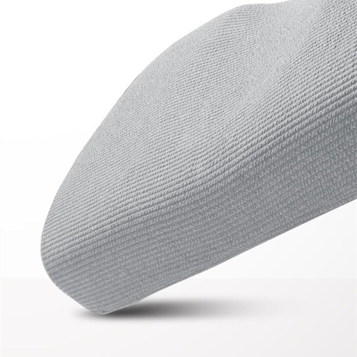 Grå ergonomisk pute i memoryskum