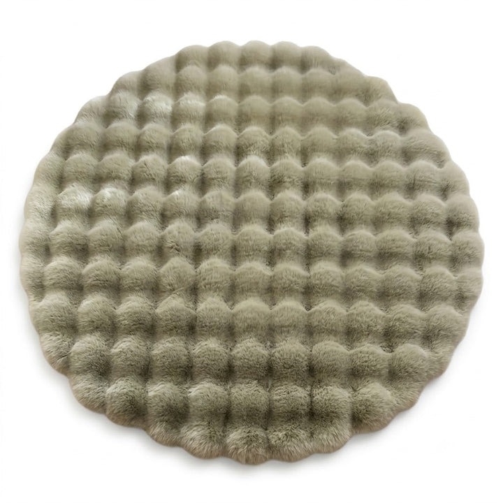 Vikbua™ Rundt luftig teppe med boblestruktur i tett, myk fleece