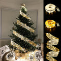 Gullbånd med LED-lys på juletre