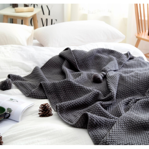 Vikbua™ Vaffelstrikket pledd med pompomdusker til sofaen