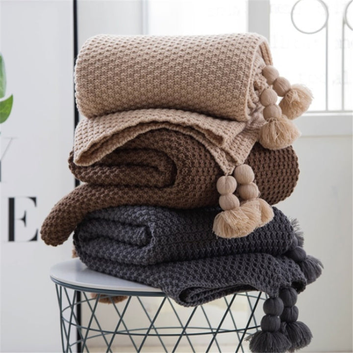 Vikbua™ Vaffelstrikket pledd med pompomdusker til sofaen
