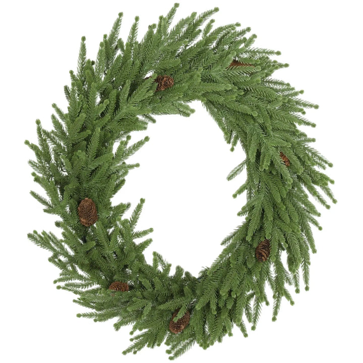 Grønn julekrans med kongler på dør