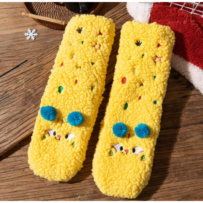 Lodne gule sokker med brodert fjes