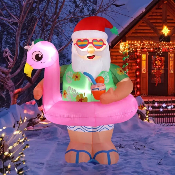 Vikbua Oppblåsbar nisse i hawaiiskjorte på rosa flamingo