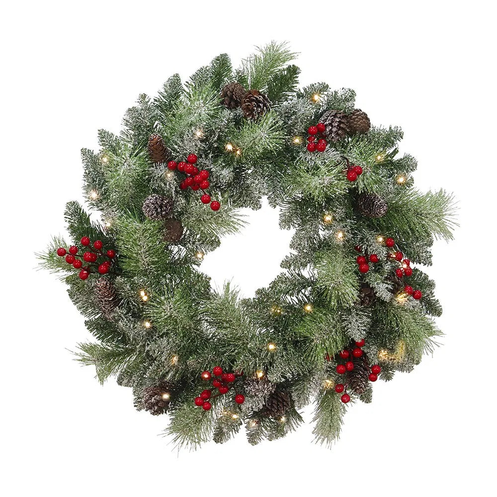 Julekrans med lys, kongler og røde bær