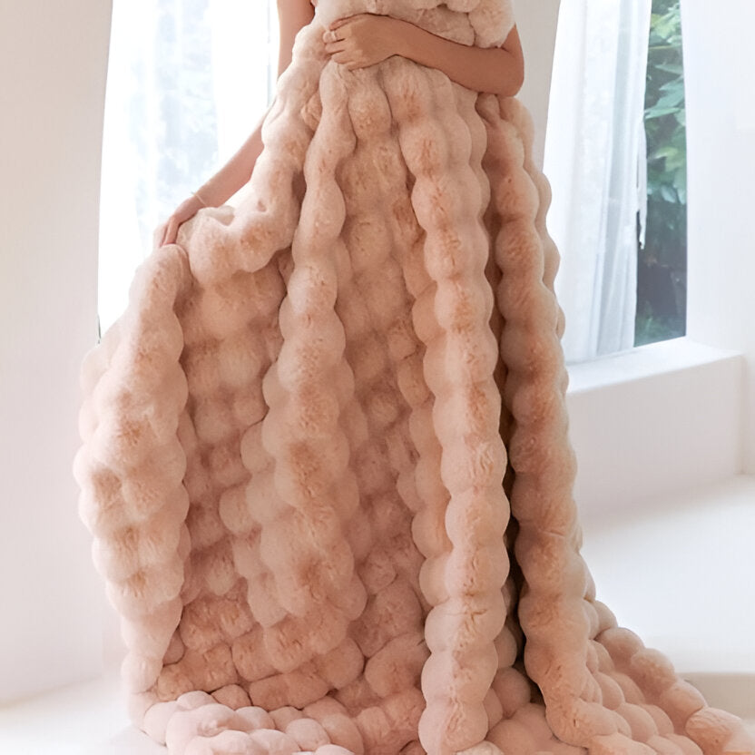 Vikbua™ Myk plysjpledd for alle årstider med stilrent design