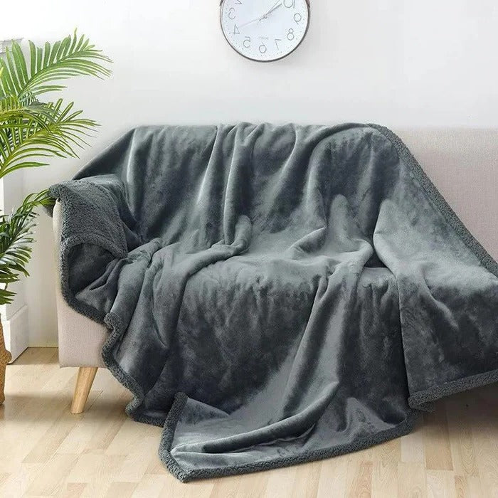 Vikbua™ Vanntett vendbart pledd til sofa og seng