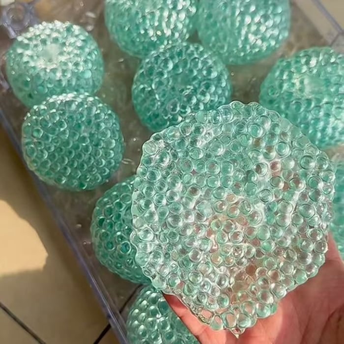 Vikbua™ Squishy stressball formet som dumpling med gelkuler