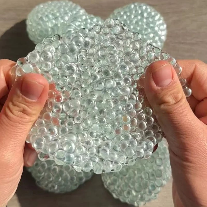 Vikbua™ Squishy stressball formet som dumpling med gelkuler